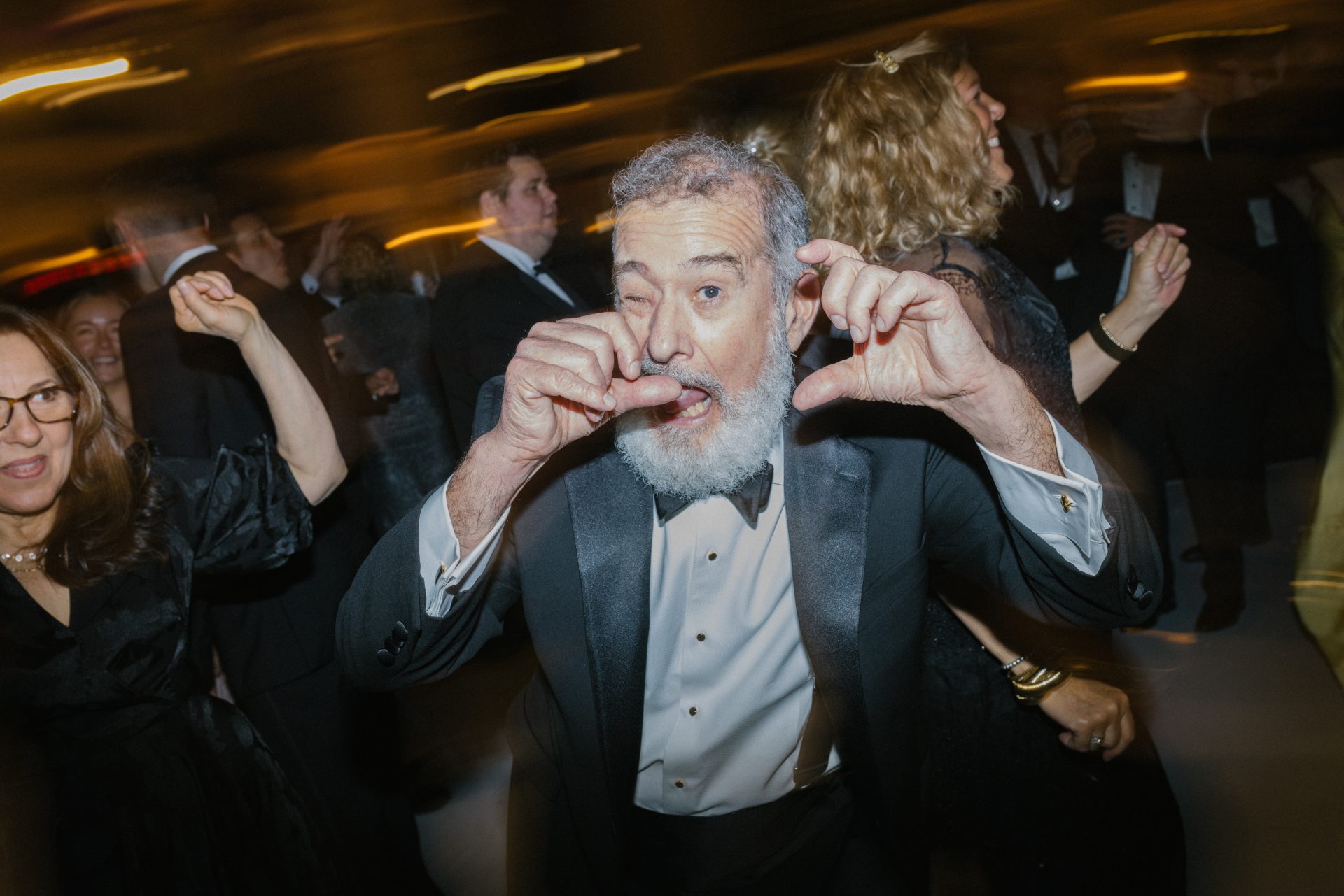 Guest dancing wildly at Ballroom at the Ben wedding reception party