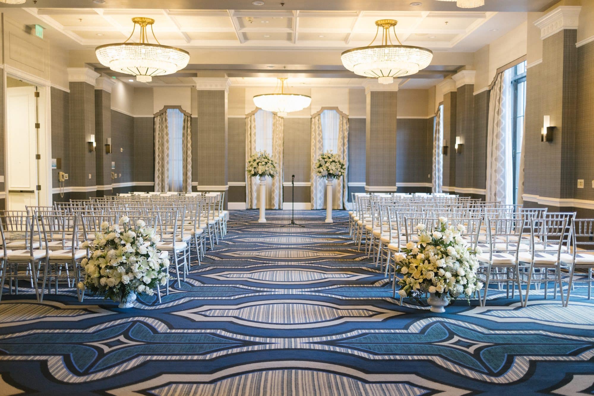 Ceremony room set with chiavari chairs and chandeliers at The Notary Hotel Philadelphia