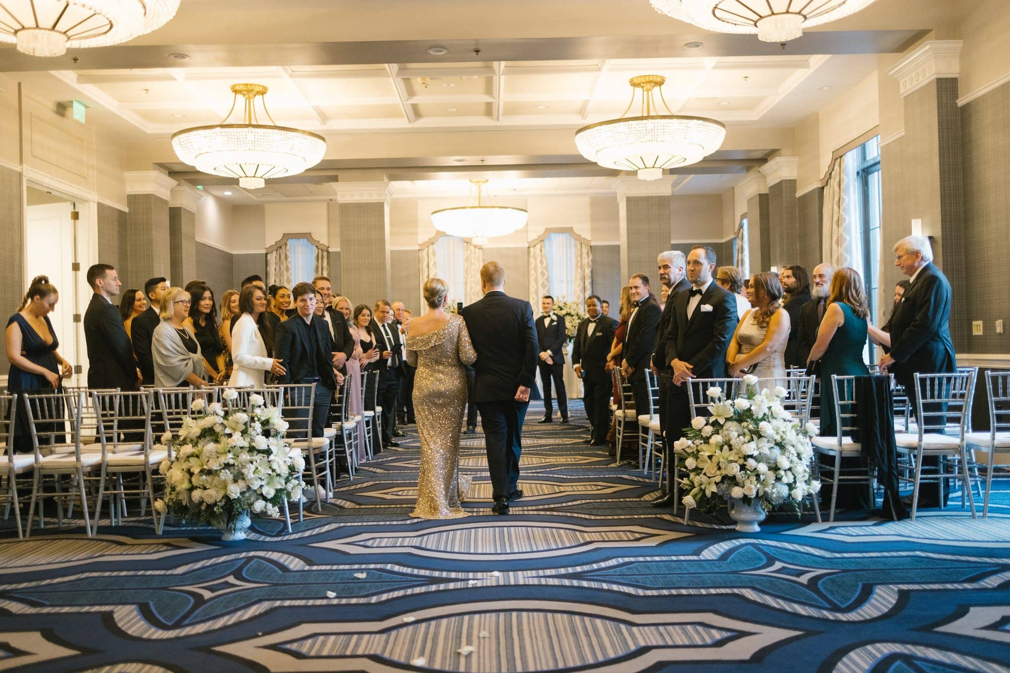 Guests seated for an indoor wedding ceremony at The Notary Hotel in Philadelphia