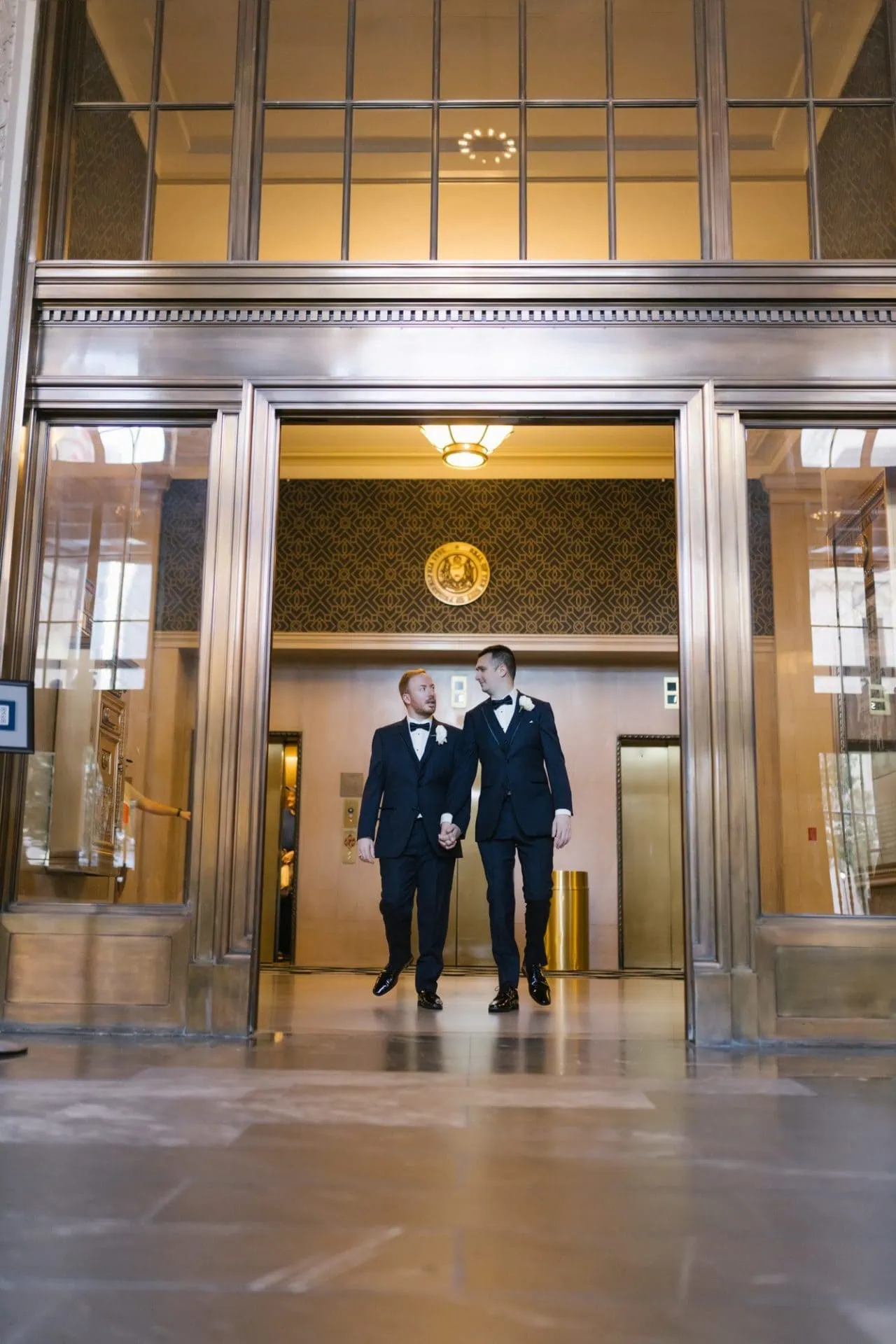 John and Carter portraits inside the Notary Hotel lobby