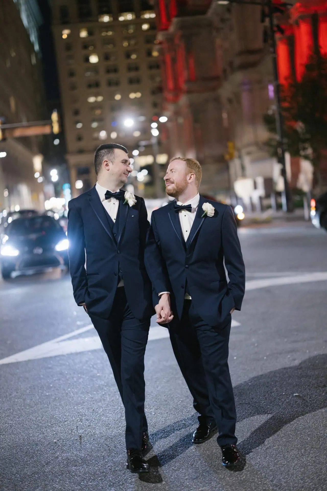 John and Carter's night portraits with Philadelphia City Hall lit red