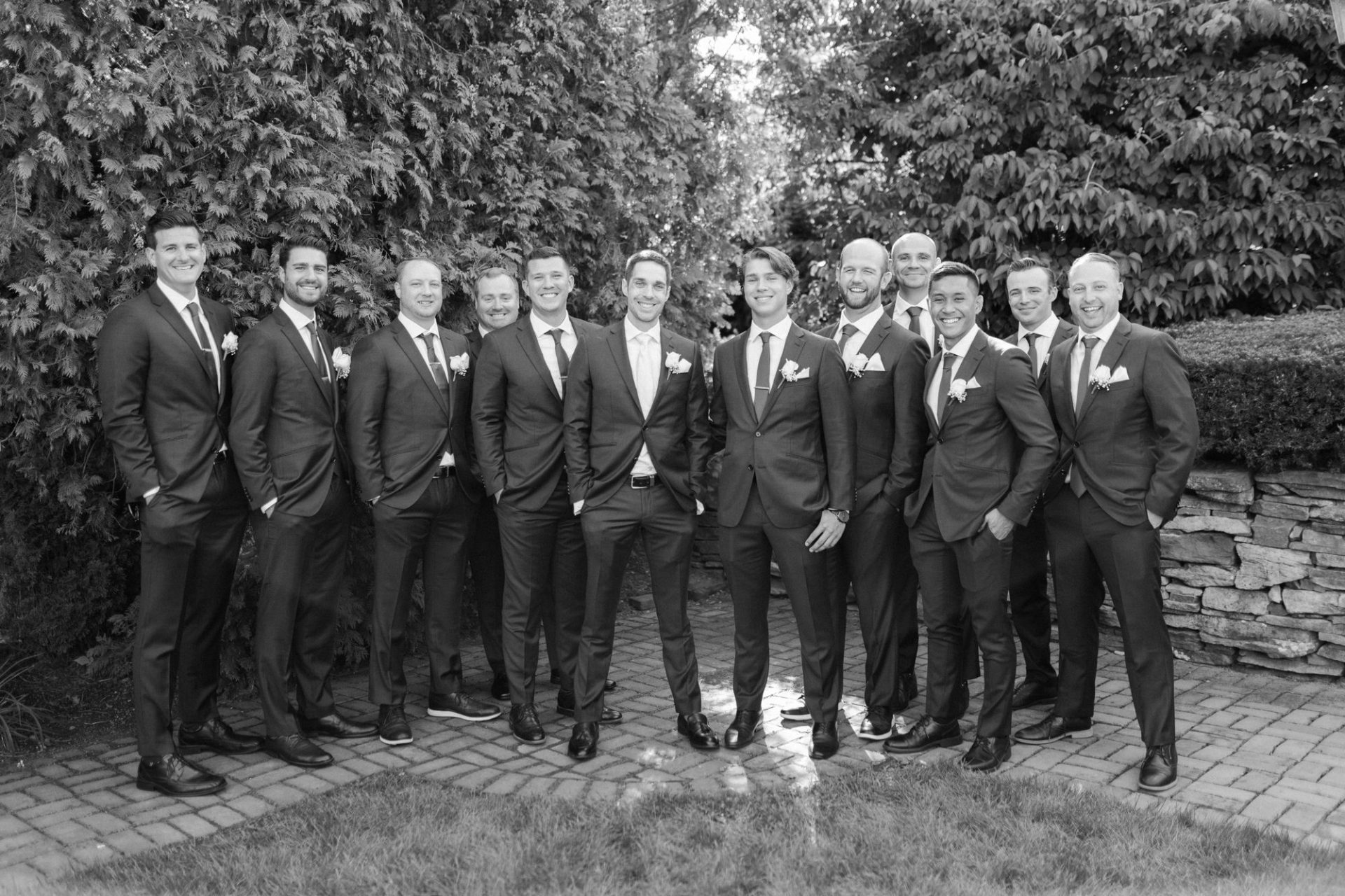 Trevor and groomsmen sharing a drink before the ceremony