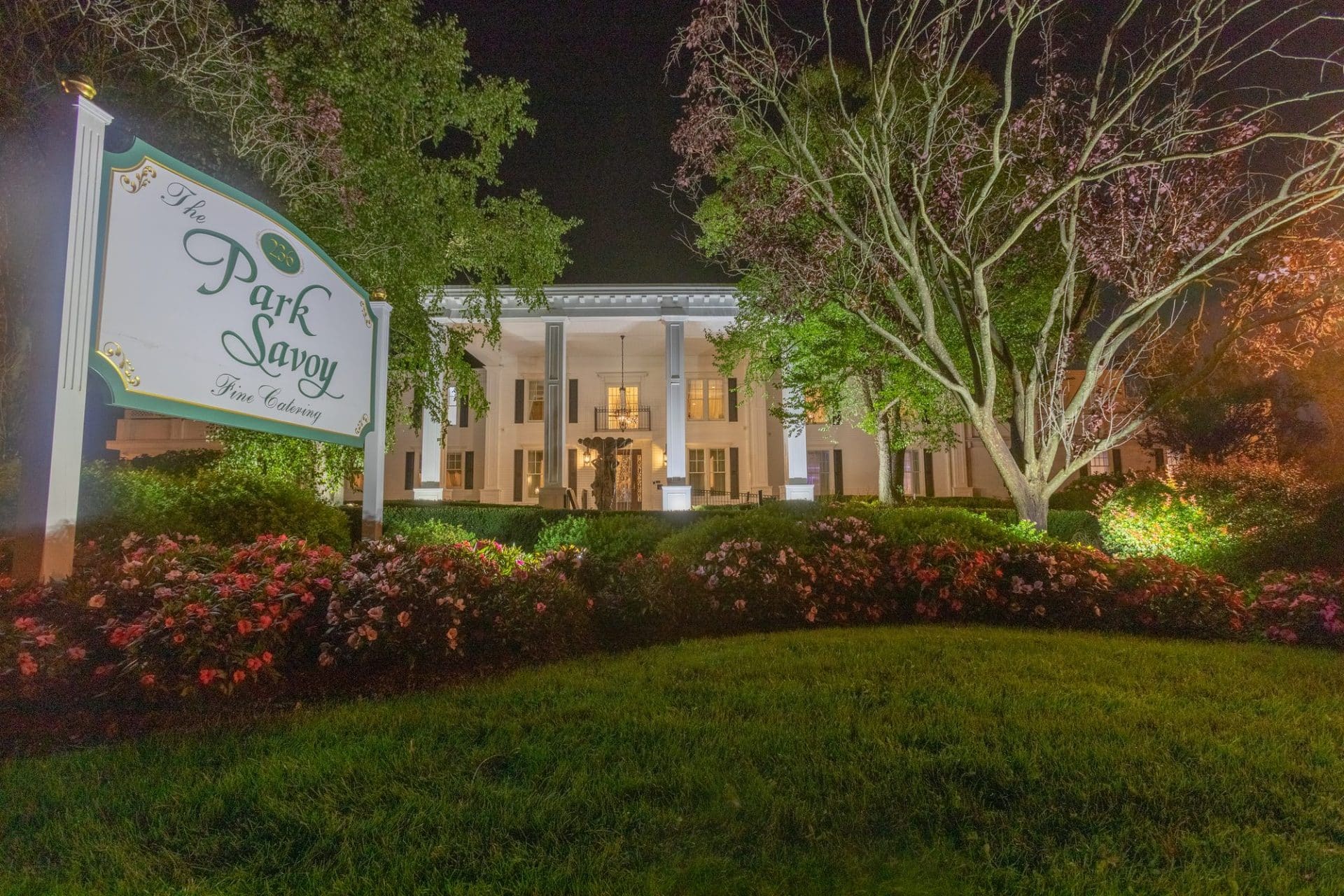 Park Savoy Estate lit up at night during the reception