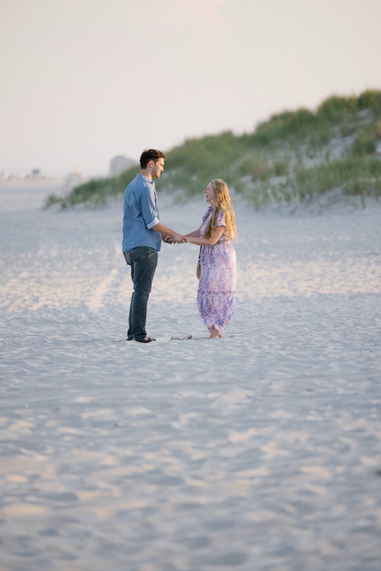 Two camera setup for surprise beach proposal photography at ICONA Avalon NJ