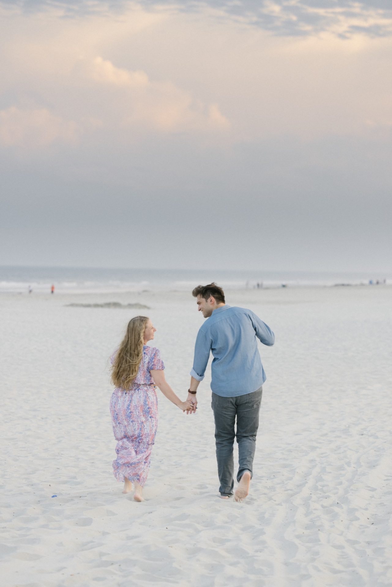 Close-up of engagement ring on Avalon NJ beach at sunset after ICONA Avalon proposal