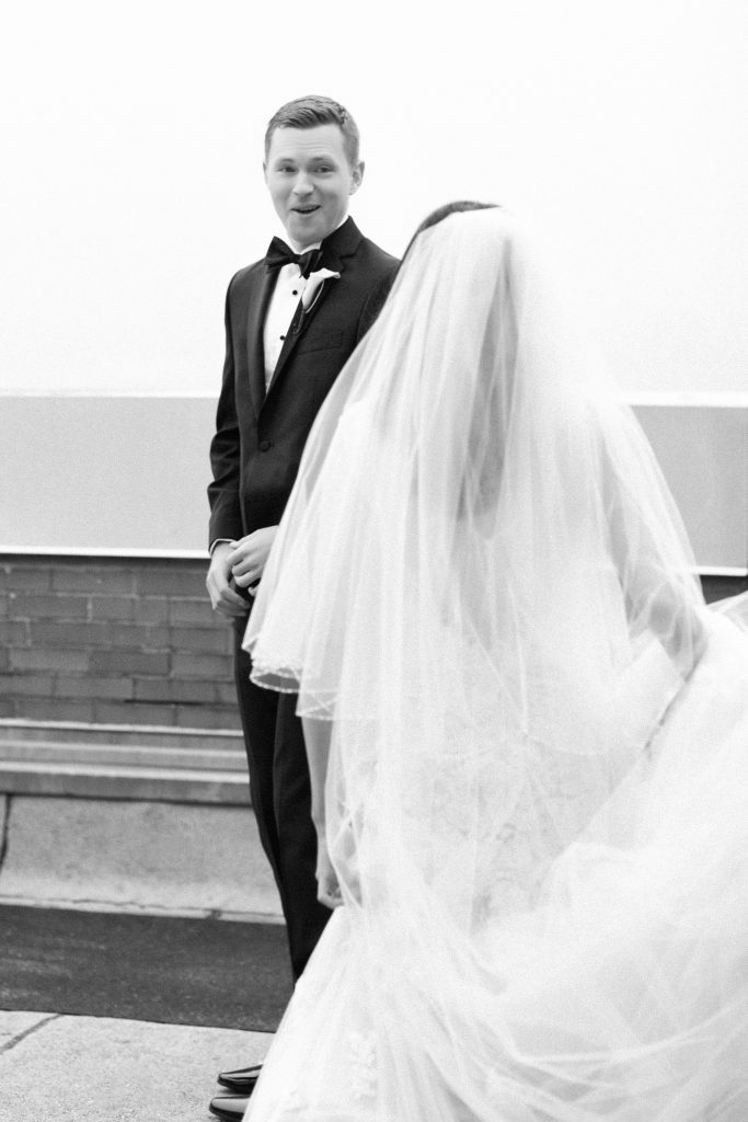 Bride and groom embrace during their first look