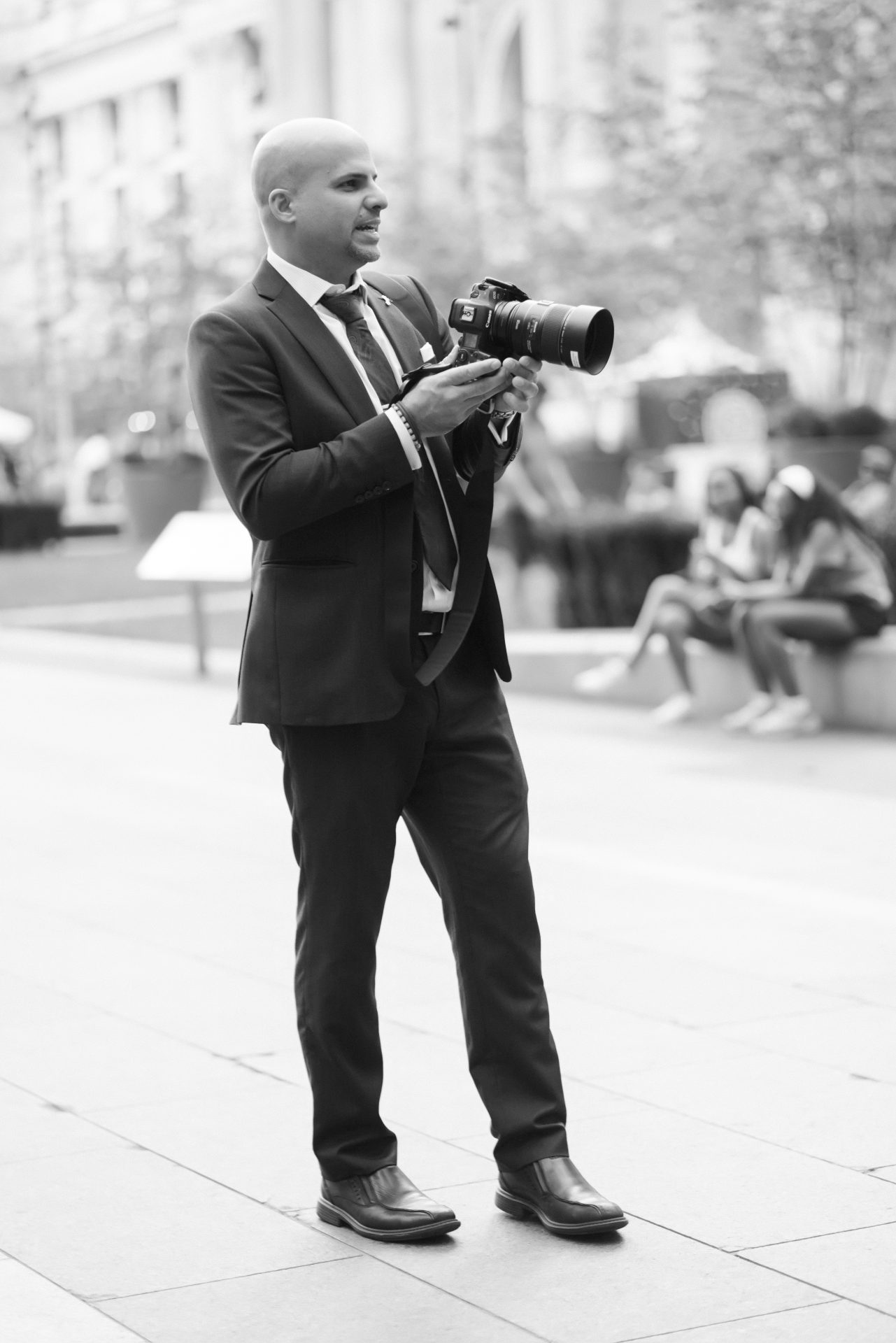 Black and white portrait of Jordan Brian, wedding photographer based in Mount Laurel, New Jersey