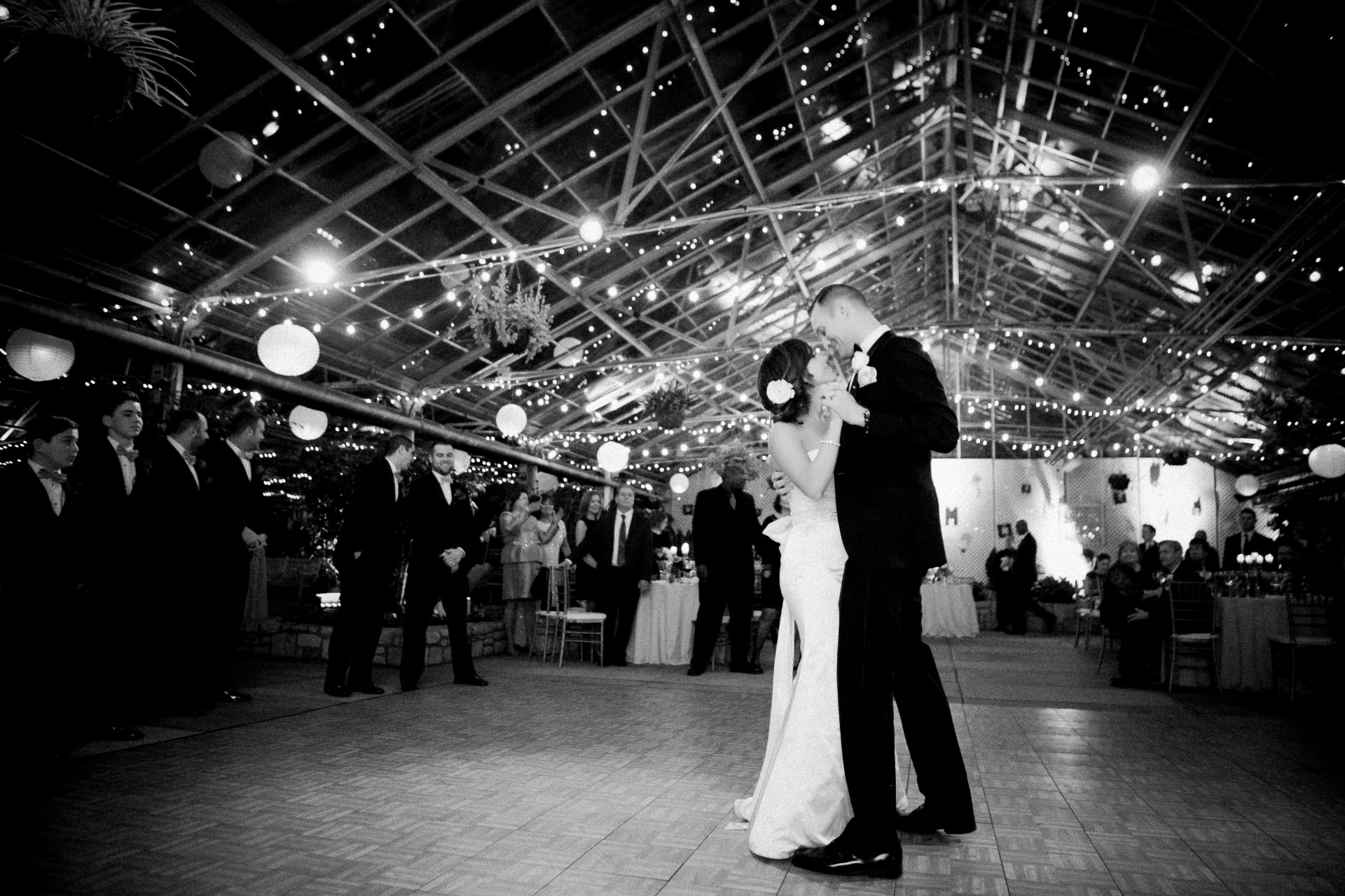 Black and white tented reception with string lights at a New Jersey wedding