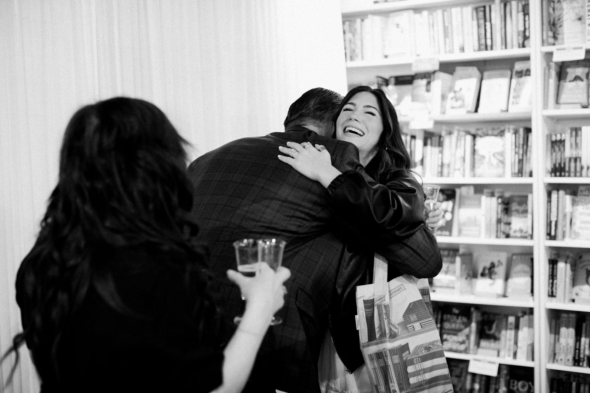 Jordan Brian Studios photographer undercover as sales associate during surprise proposal at Inkwood Books Haddonfield NJ