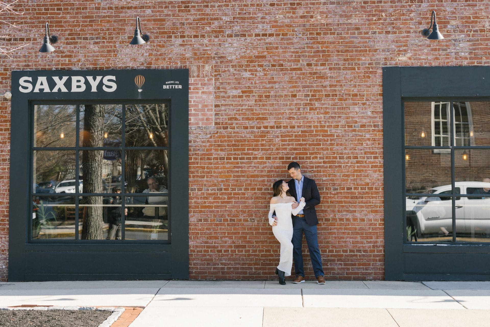 Newly engaged couple portraits on Kings Highway in downtown Haddonfield NJ