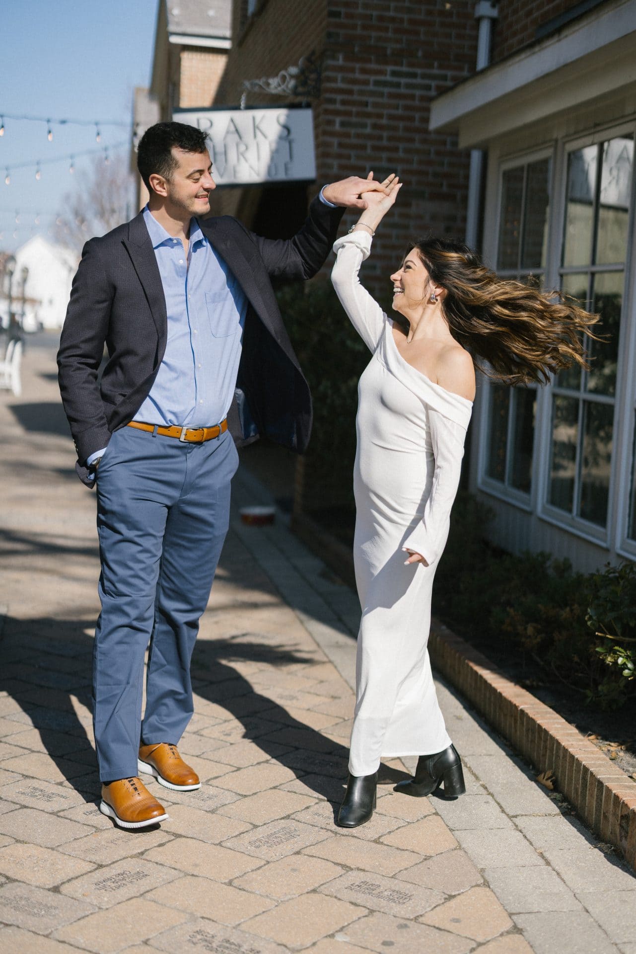 Candid laughing portrait of engaged couple in Haddonfield NJ South Jersey