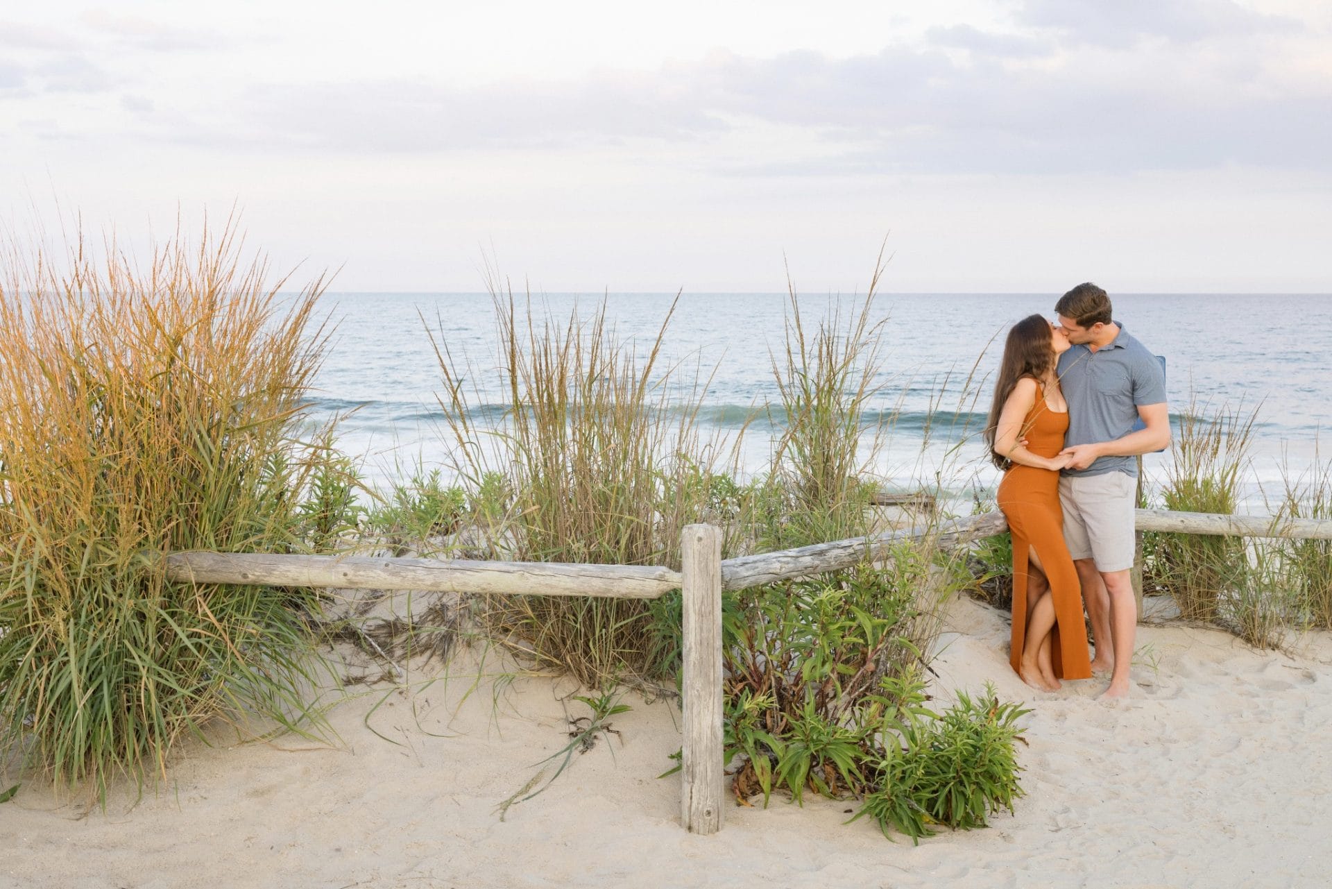Engagement portrait at sunset on the beach in Brant Beach, Long Beach Island, NJ