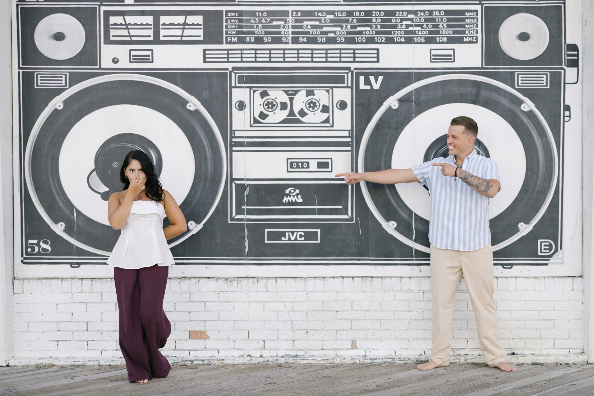 Engagement portrait at the boombox mural in Asbury Park NJ