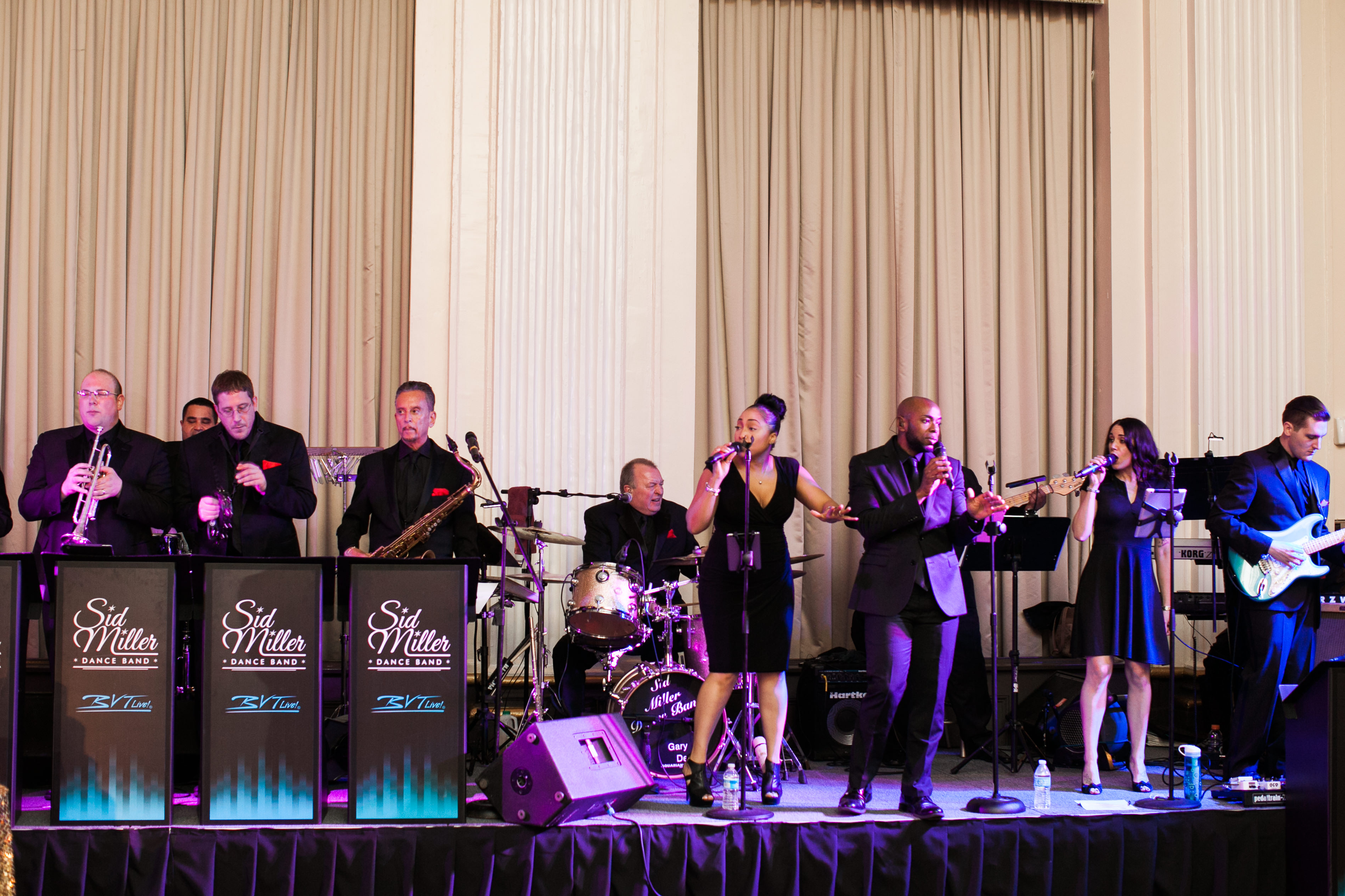 Live band performing on the permanent stage at the Ballroom at the Ben in Philadelphia, photographed by Jordan Brian