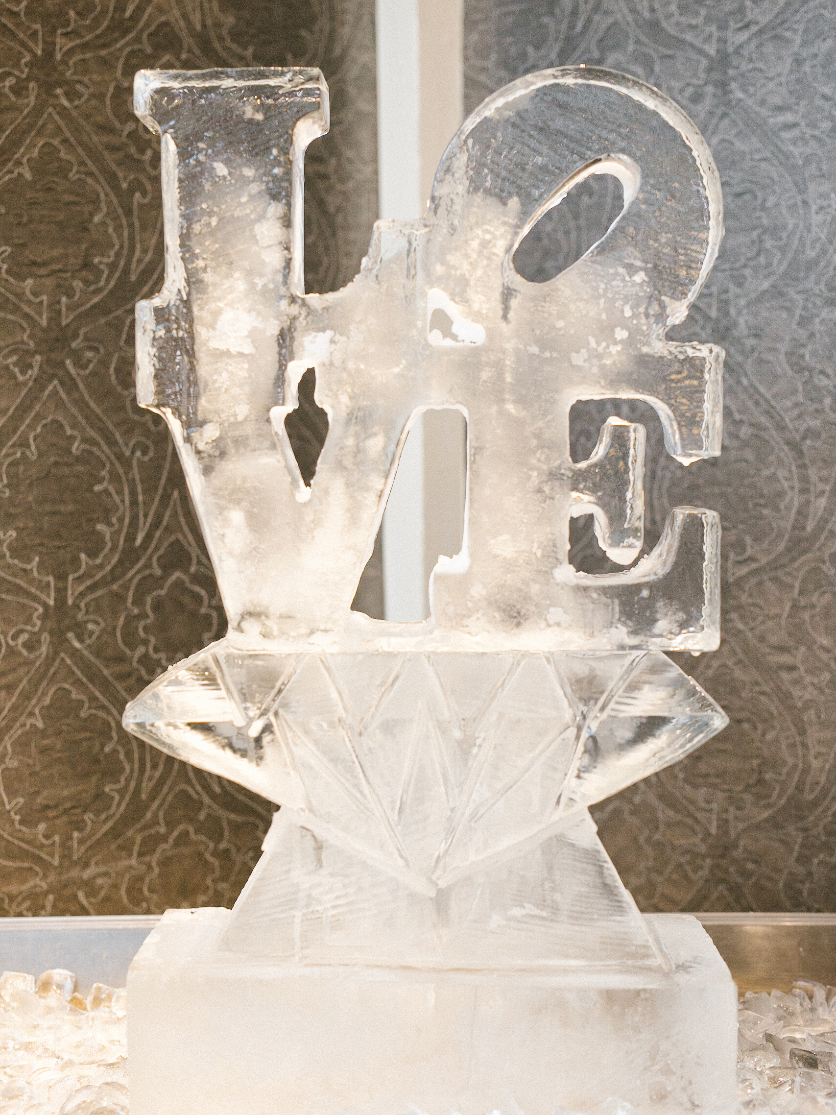 Custom LOVE ice sculpture at a Ballroom at the Ben cocktail hour in Philadelphia, photographed by Jordan Brian