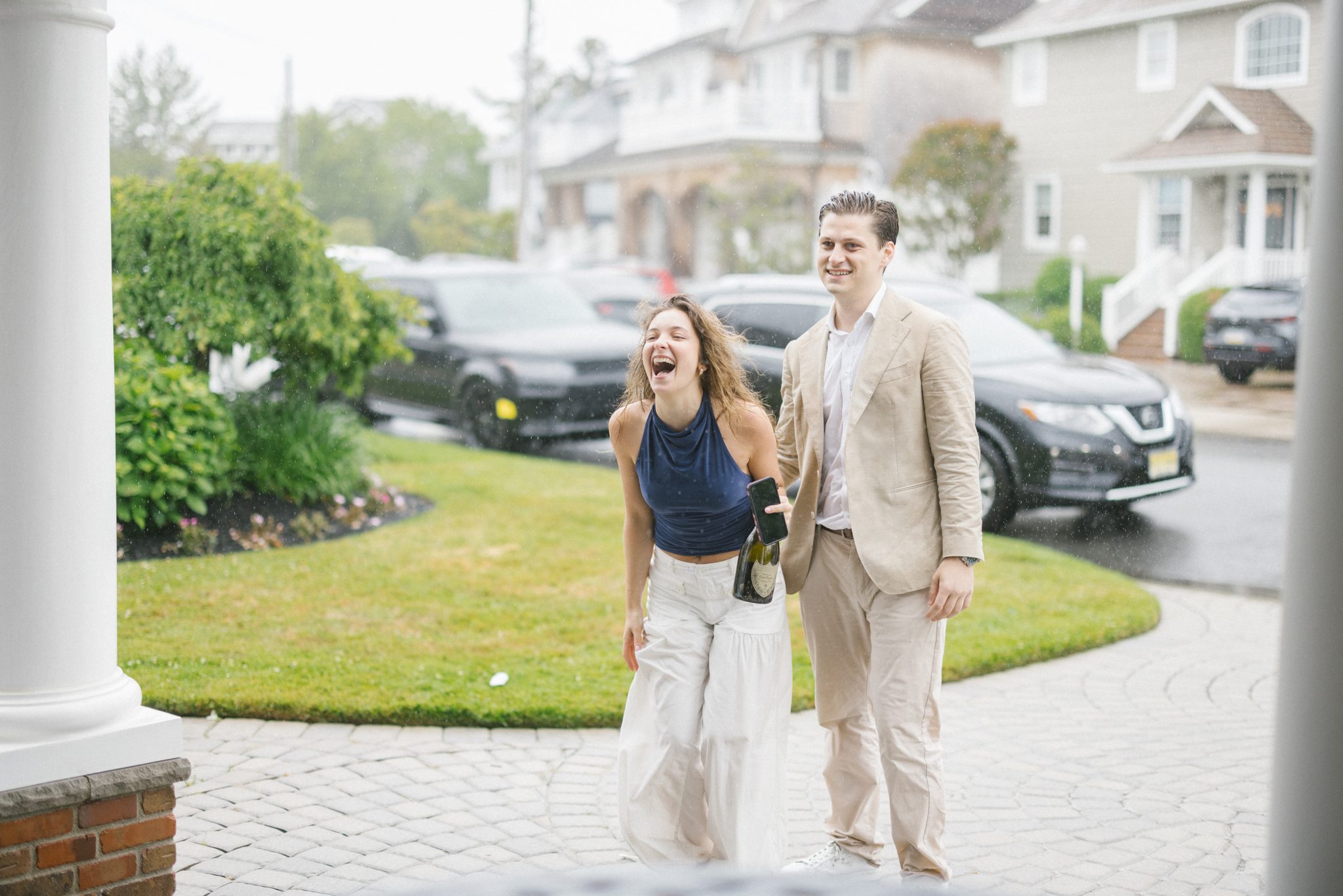 Newly engaged couple arriving at their surprise engagement party in Ocean City NJ