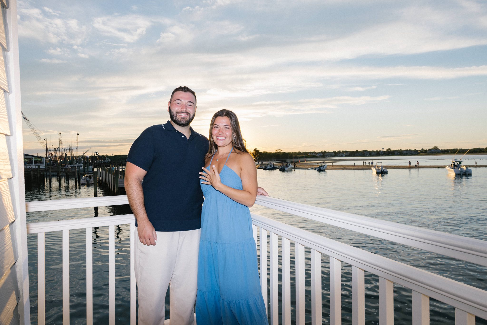 Sunset portrait of Anthony and Juliette on the Harbor Point balcony in Point Pleasant Beach NJ