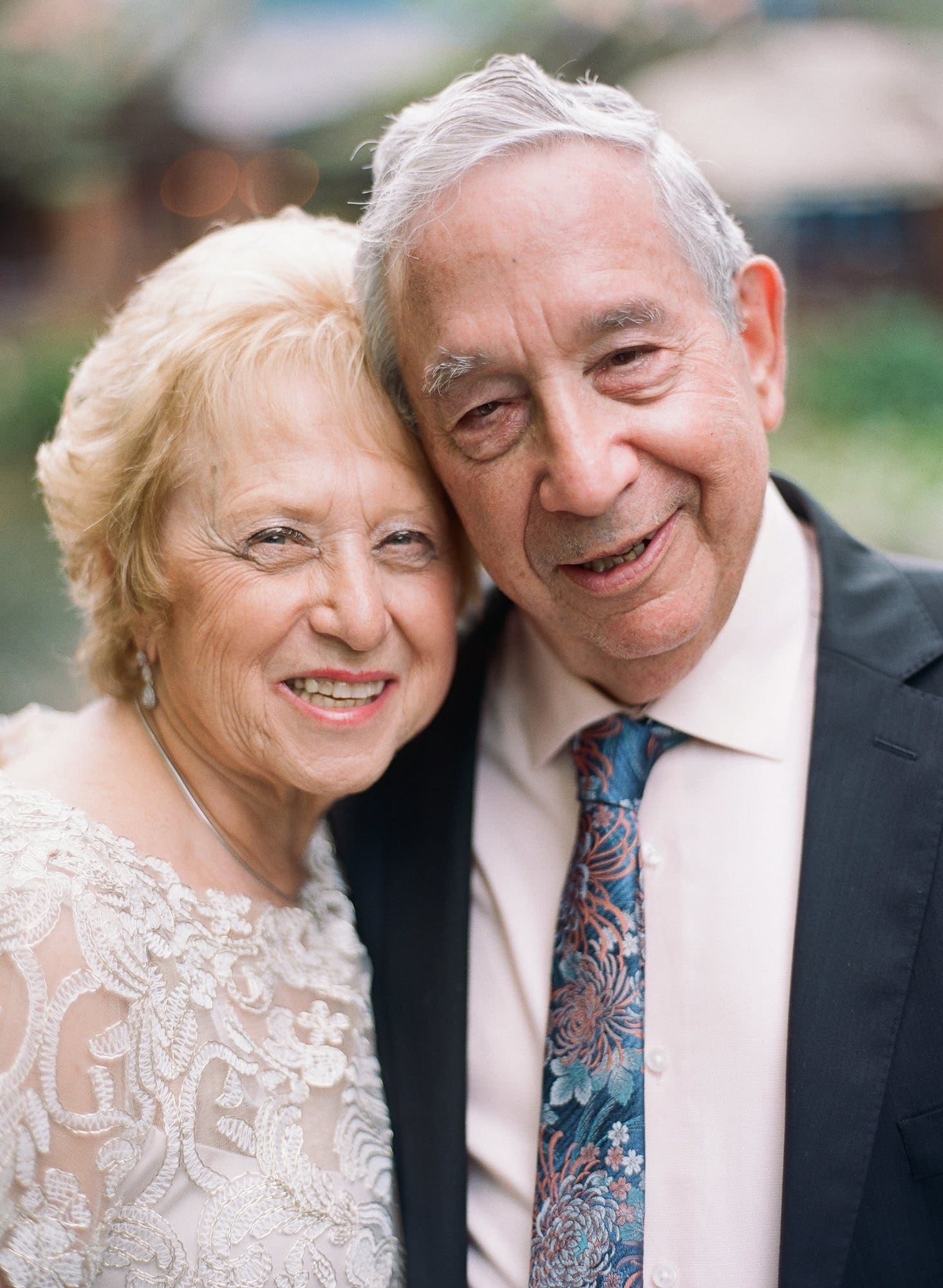 A couple close together during their 50th wedding anniversary vow renewal portrait in New Jersey