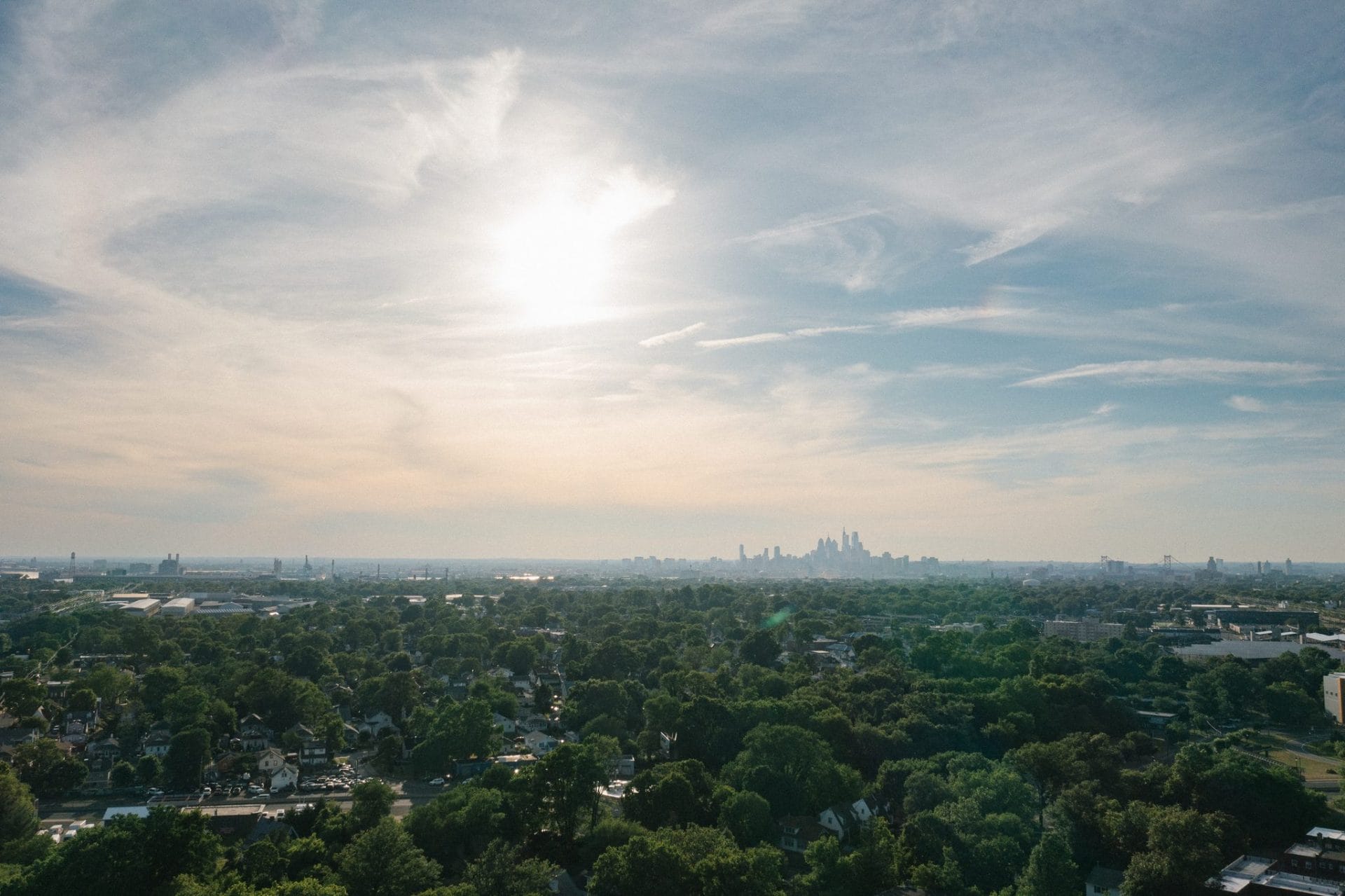 Aerial view of Collingswood New Jersey at sunset with the Philadelphia skyline on the horizon