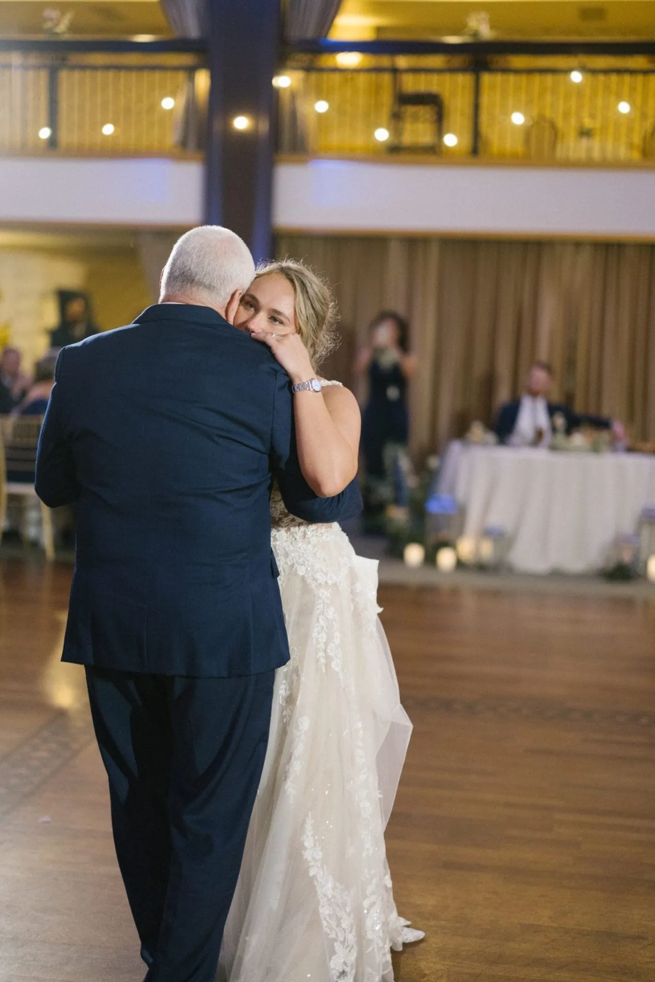 Parent dance under the chandelier at a Collingswood Grand Ballroom wedding