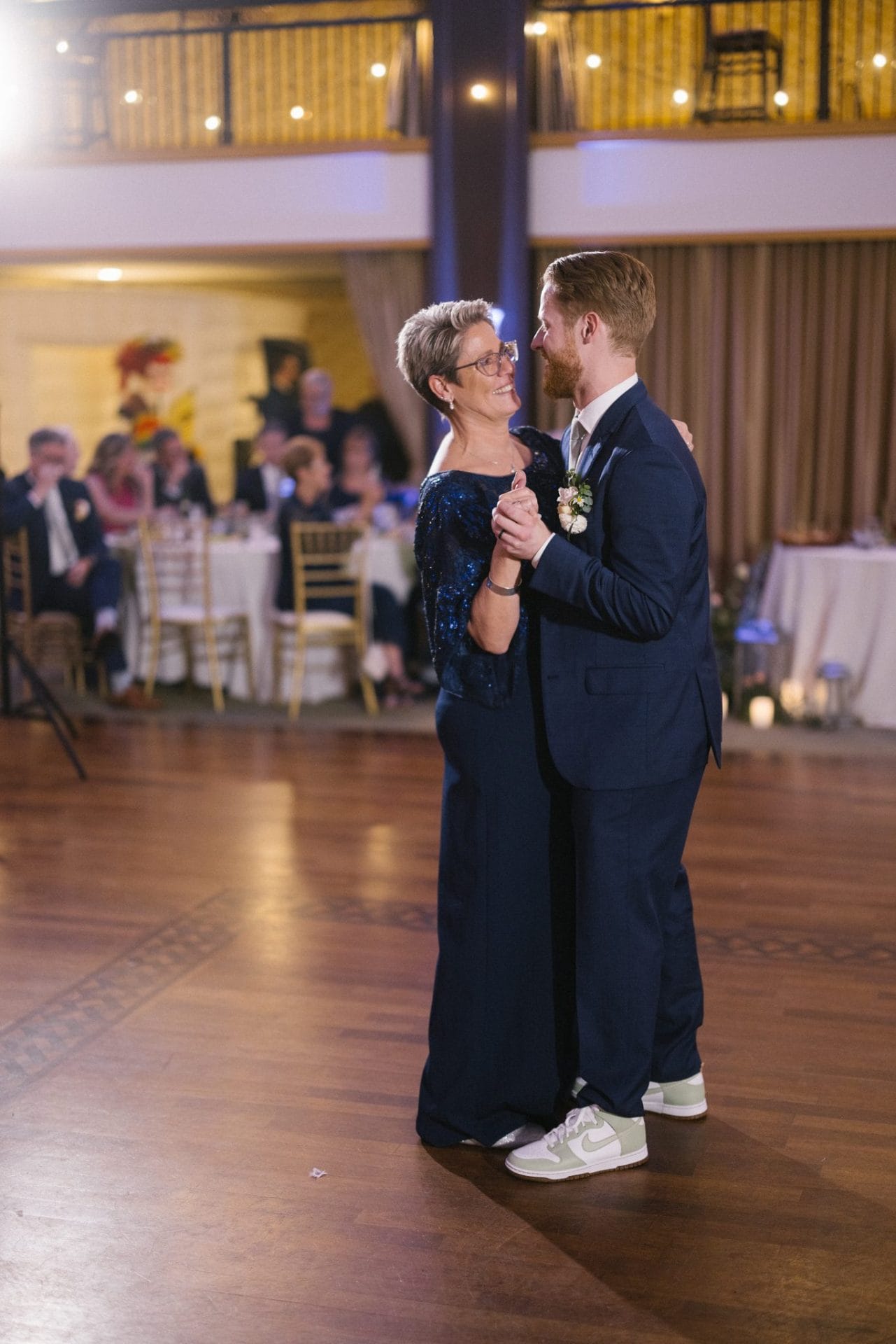 Guests dancing in the lower level of the Collingswood Grand Ballroom during a wedding reception