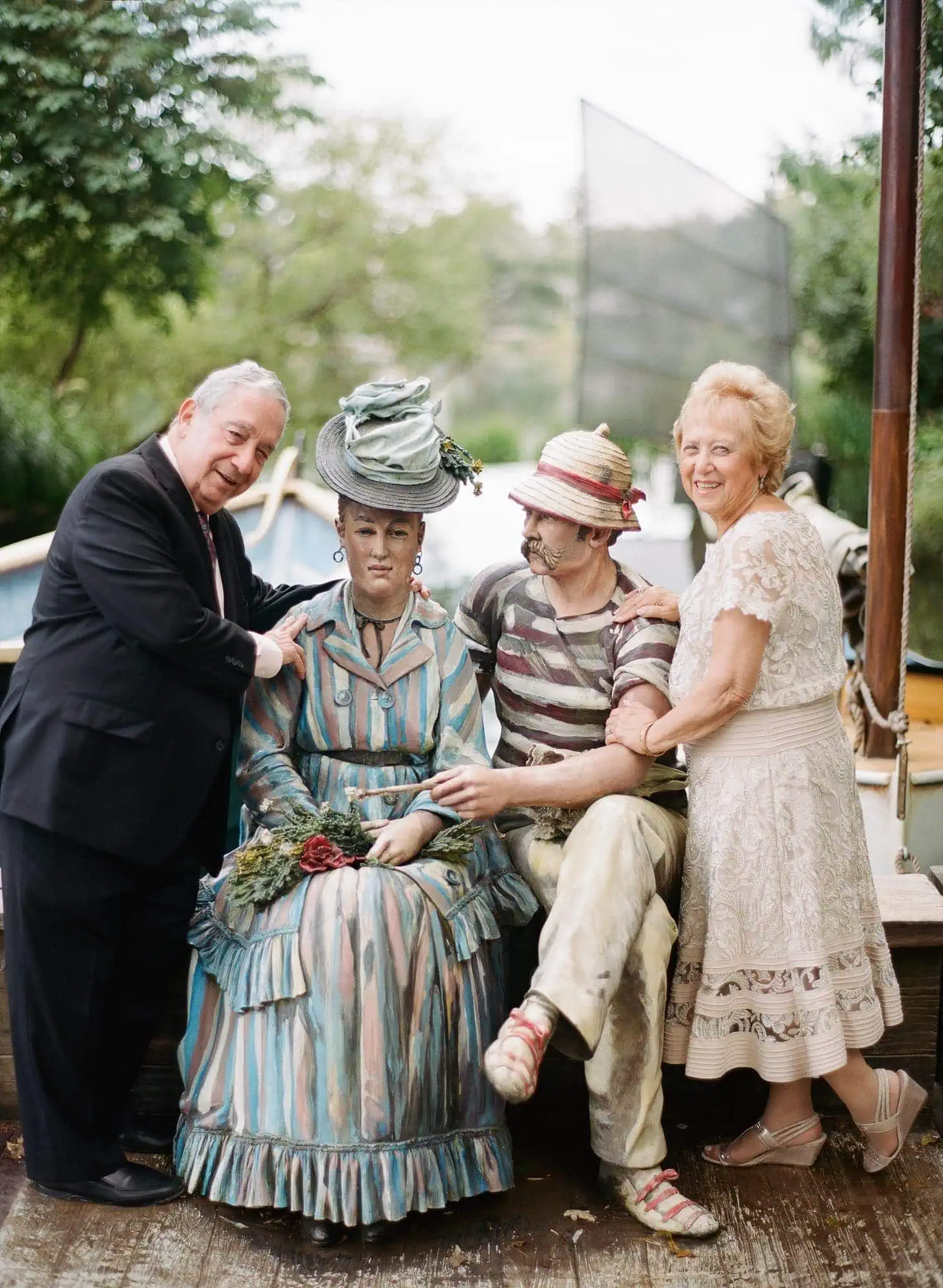 An older couple beside a Seward Johnson sculpture at Grounds for Sculpture, photographed on film