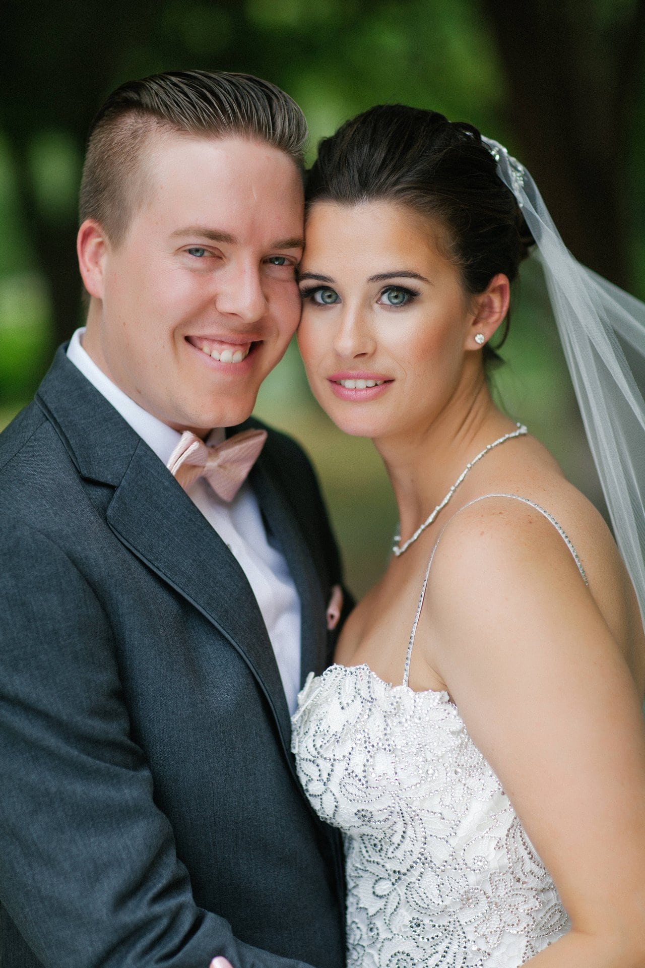 Close portrait of the bride and groom before the ceremony
