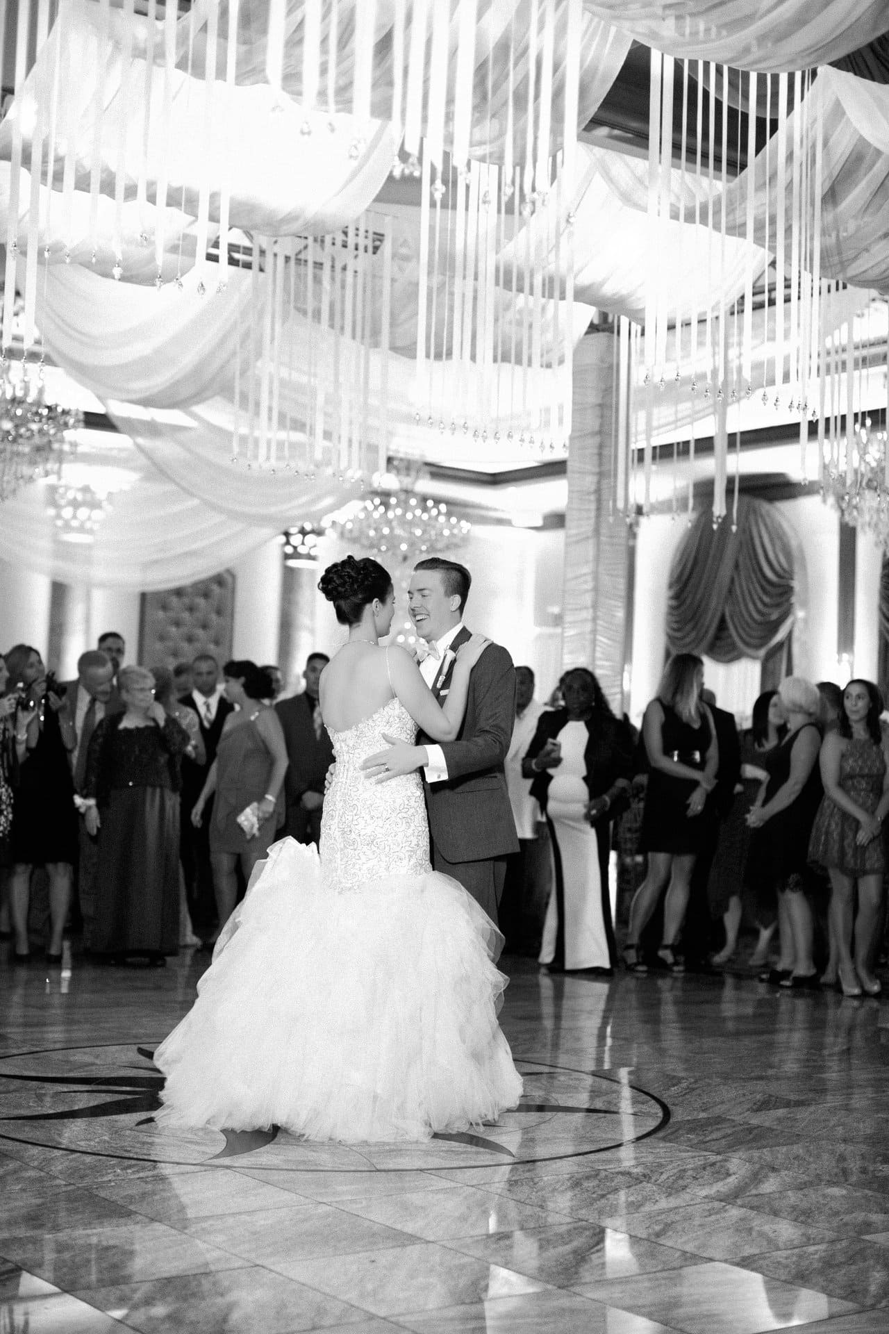 First dance under the draped ballroom ceiling