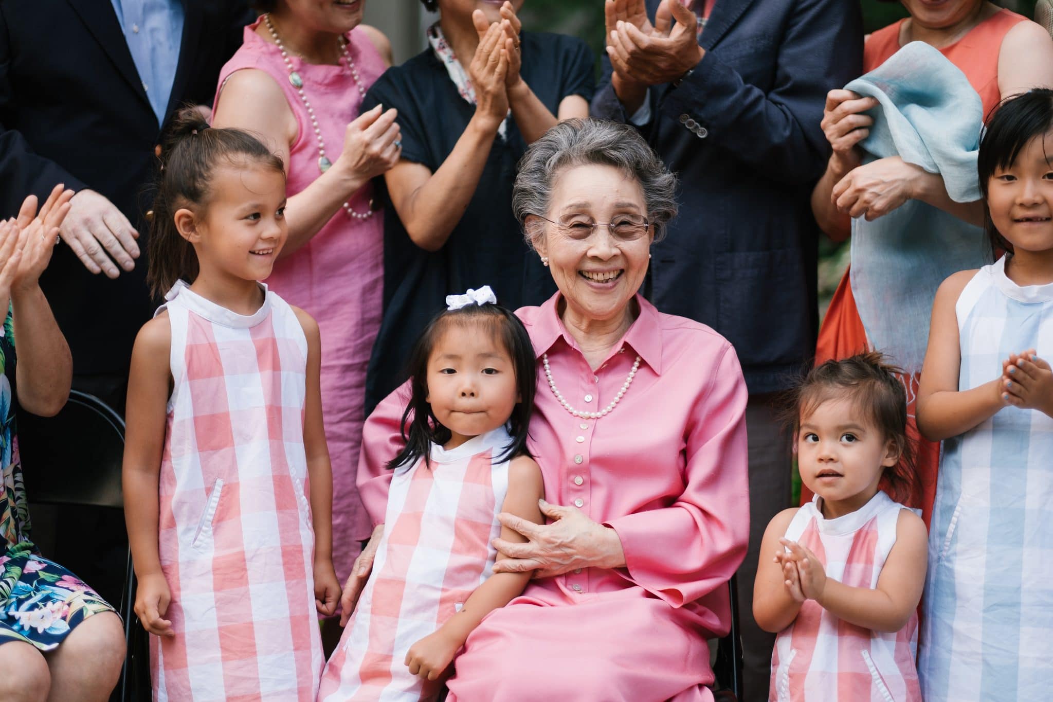 Grandchildren and their grandmother reacting to the surprise proposal at The Rittenhouse in Philadelphia