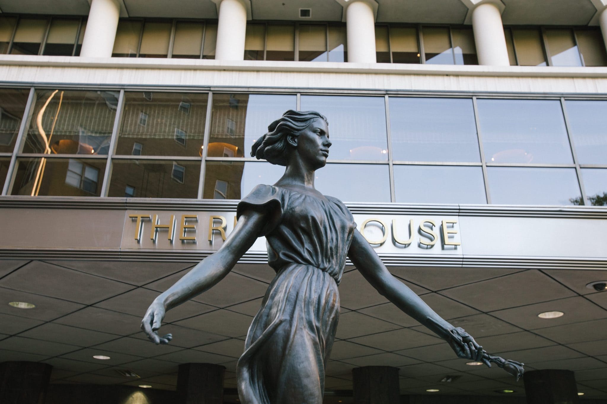 The exterior and entrance statue at The Rittenhouse in Philadelphia