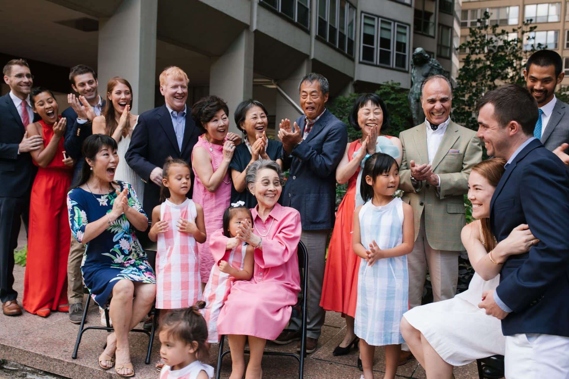 A surprise proposal on one knee in front of the entire family at The Rittenhouse in Philadelphia